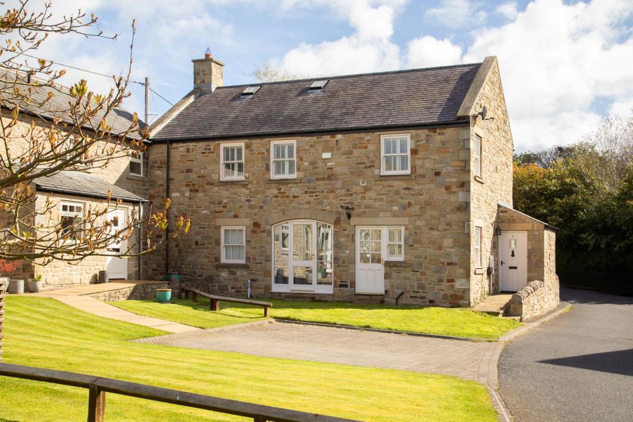 Though traditional in appearance, this cottage is thoroughly modern inside. Photo: Finest Properties