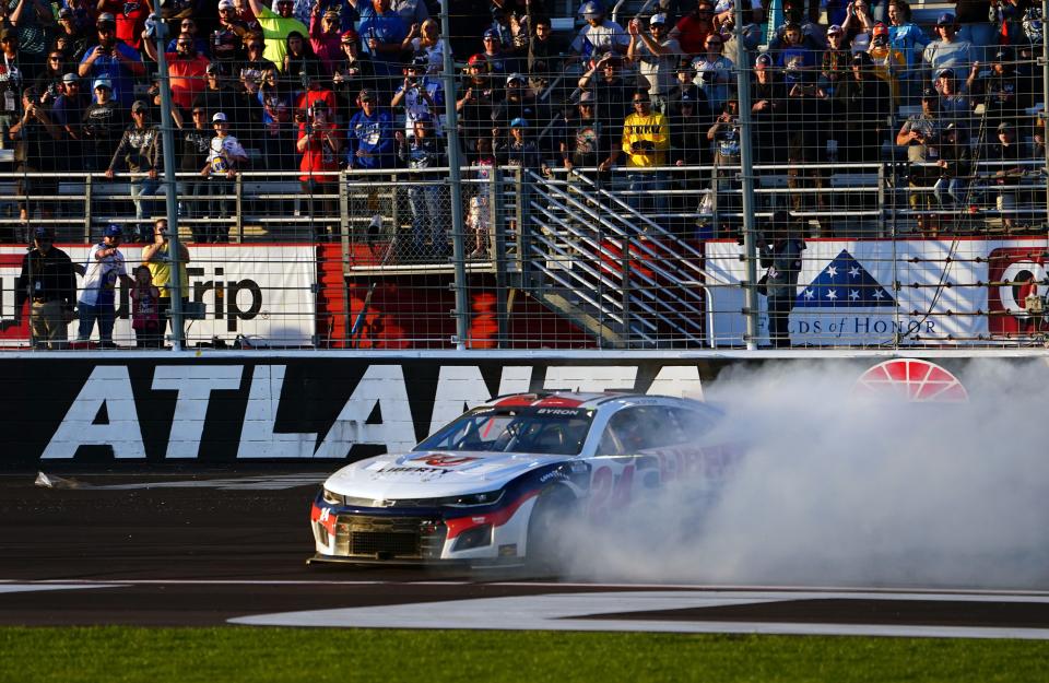 William Byron performs a burnout after winning the NASCAR Cup Series race at Atlanta Motor Speedway on March 20, 2022.