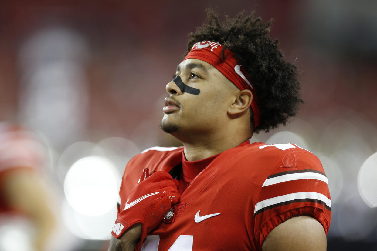 FILE - Ohio State quarterback C.J. Stroud plays against Penn State during an NCAA college football game, Oct. 30, 2021, in Columbus, Ohio. A Buckeyes attack that led the nation with 561 yards and nearly 46 points per game returns quarterback C.J. Stroud, leading receiver Smith-Njigba, 1,200-yard rusher TreVeyon Henderson and an experienced offensive line anchored by 6-foot-8, 360-pound right tackle Dawand Jones. (AP Photo/Jay LaPrete, File)