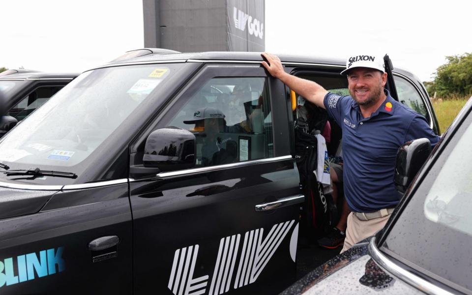 Northern Ireland's Graeme McDowell prepares to take his black cab to the 3rd tee to begin his round on the first day of the LIV Golf Invitational Series event at The Centurion Club - AFP