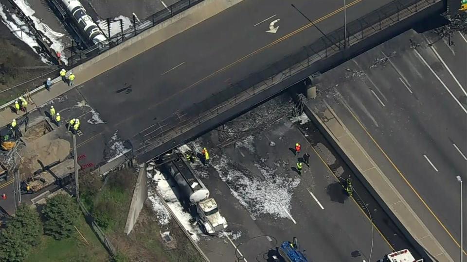 A fuel tanker crashed and burst into flames under an overpass on I-95 in Norwalk, Connecticut on May 2, 2024. The highway remained closed a crews evaluated the damage.  / Credit: Chopper 2