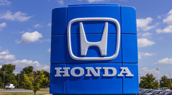 honda logo on a sign outside a honda dealership