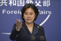 Chinese Foreign Ministry spokesperson Hua Chunying speaks during the daily press briefing at the Foreign Ministry in Beijing on Wednesday, Jan. 20, 2021. China's Foreign Ministry described outgoing U.S. Secretary of State Mike Pompeo on Wednesday as a "doomsday clown" and said his designation of China as a perpetrator of genocide and crimes against humanity was merely "a piece of wastepaper." (AP Photo/Liu Zheng)