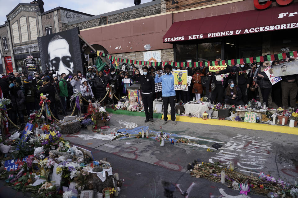 People gather at Cup Foods after a guilty verdict was announced at the trial of former Minneapolis police Officer Derek Chauvin for the 2020 death of George Floyd, Tuesday, April 20, 2021, in Minneapolis, Minn. Former Minneapolis police Officer Derek Chauvin has been convicted of murder and manslaughter in the death of Floyd. (AP Photo/Morry Gash)