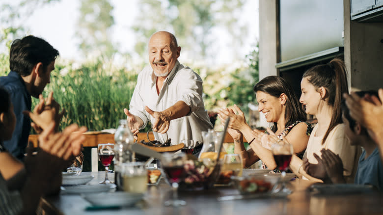 People enjoying party food