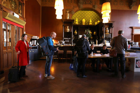 Dutch voters line up to vote in the European elections at the Central Station in Amsterdam, Netherlands May 23, 2019. REUTERS/Eva Plevier