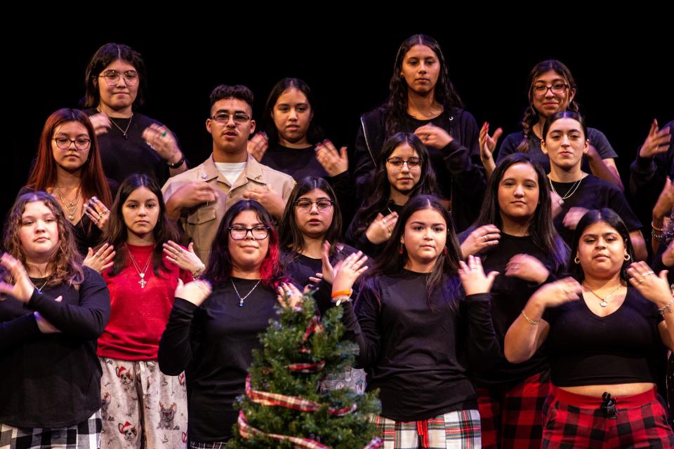 Miller High School students sing and sign "We Wish you a Merry Christmas" during an American Sign Language concert at Veterans Memorial High School, on Friday, Dec. 16, 2022, in Corpus Christi, Texas.