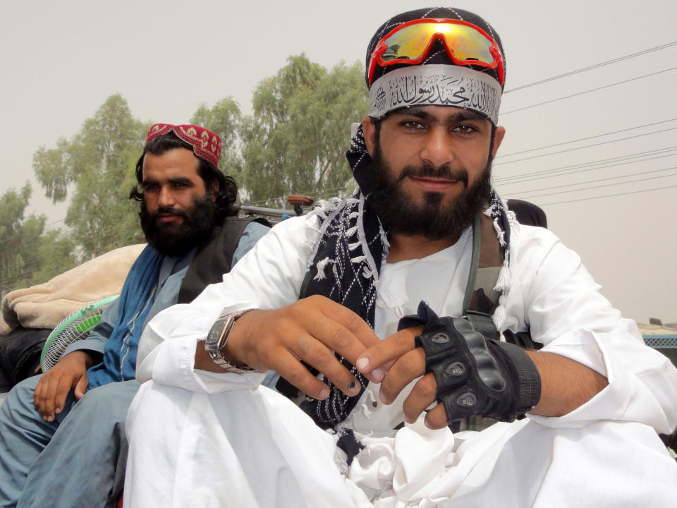 Taliban fighters pose for a photograph in the city of Kandahar, southwest Afghanistan (Sidiqullah Khan/AP)