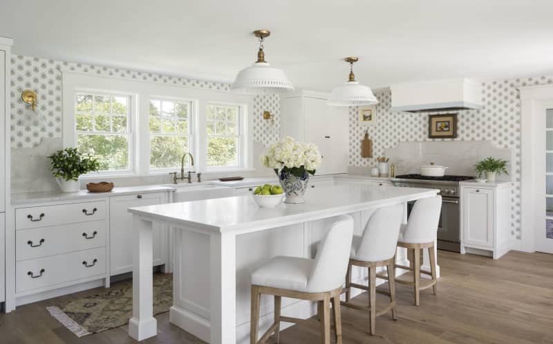 A blue, white and warm wooden kitchen.