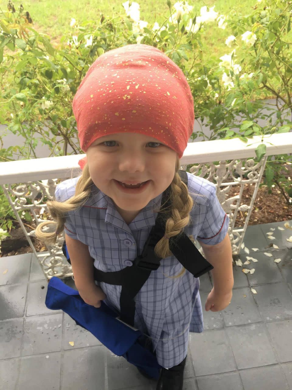 Always with a smile on her face, Evie was able to start school this year. Photo: Supplied