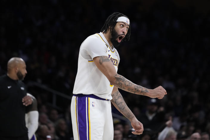 Los Angeles Lakers' Anthony Davis reacts to a foul call on him during the second half of an NBA basketball game against the Golden State Warriors Sunday, March 5, 2023, in Los Angeles. (AP Photo/Jae C. Hong)
