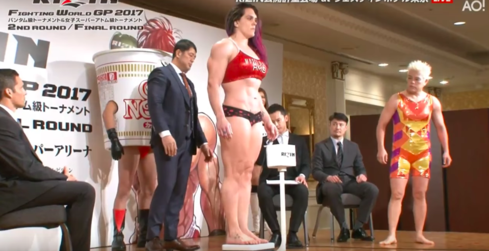 This weigh-in did not go as expected. (Screenshot via ReactQ on Youtube)