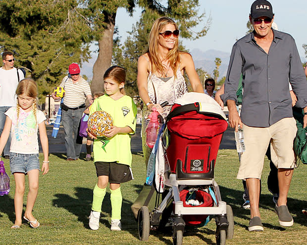 Denise Richards and ex Charlie Sheen stroll with their girls, Lola and Sam, and Denise's new daughter, Eloise (Aguilar/Jones/PacificCoastNews.com)