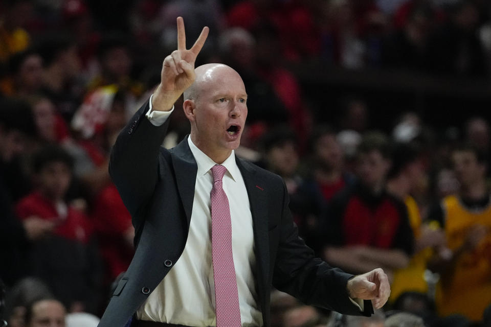 Maryland head coach Kevin Willard talks to his team during the first half of an NCAA college basketball game against Purdue, Thursday, Feb. 16, 2023, in College Park, Md. (AP Photo/Julio Cortez)