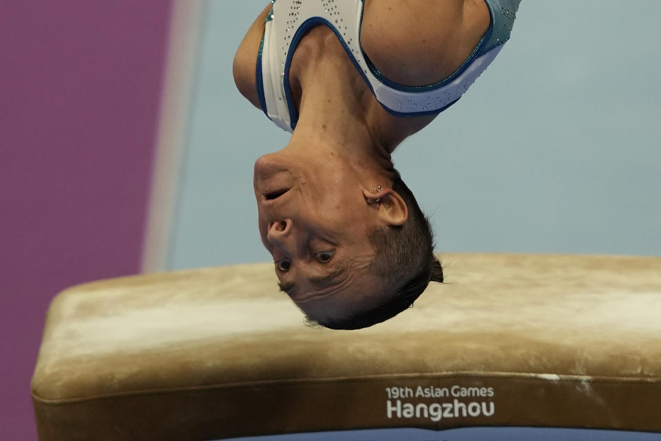 48 years old Uzbekistan's Oksana Chusovitina competes in the Artistic Gymnastics Women's Vault event of the 19th Asian Games in Hangzhou, China, Thursday, Sept. 28, 2023. Oksana Chusovitina competed in her first Olympics in 1992 in Barcelona. Now 48, and she's not done yet despite the fact her competition is generations younger. Few were even born when she won Olympic gold. She finished fourth in the vault this week at the Asian Games and says she's aiming for next year's Olympics in Paris, when she would be 49.(AP Photo/Ng Han Guan)