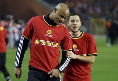 Belgium's Vincent Kompany listens to Eden Hazard (R) after winning against Israel during their Euro 2016 group B qualifying soccer match at King Baudouin stadium in Brussels, October 13, 2015. REUTERS/Francois Lenoir