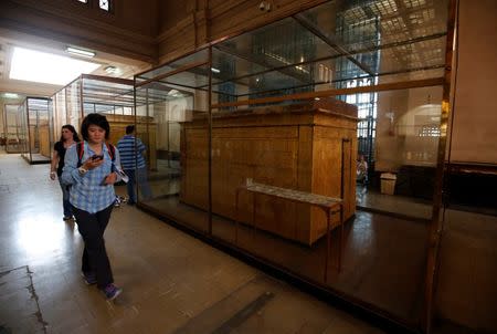 Tourists walk around the golden statues and collectibles of pharaoh King Tutankhamun inside the Egyptian Museum in Cairo, Egypt June 23, 2016. Picture taken June 23, 2016. REUTERS/Amr Abdallah Dalsh