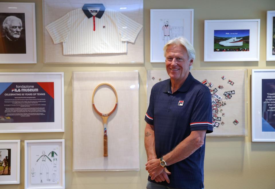 Tennis legend Bjorn Borg is surrounded by memorabilia from his era of competitive tennis while attending the BNP Paribas Open in Indian Wells, Calif., March 10, 2023. 