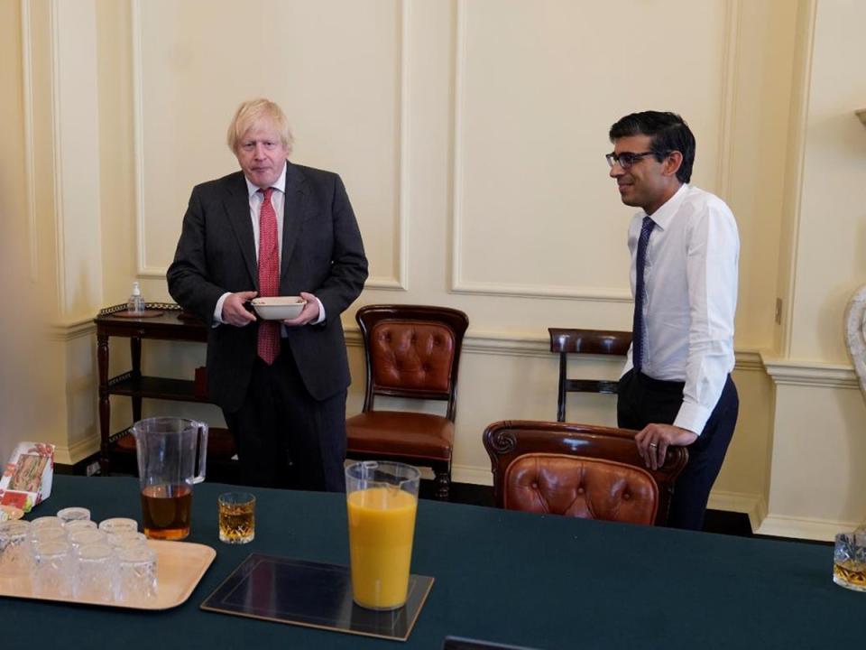 Boris Johnson and Rishi Sunak at the June 2020 gathering that saw both of them fined (Cabinet Office/PA)
