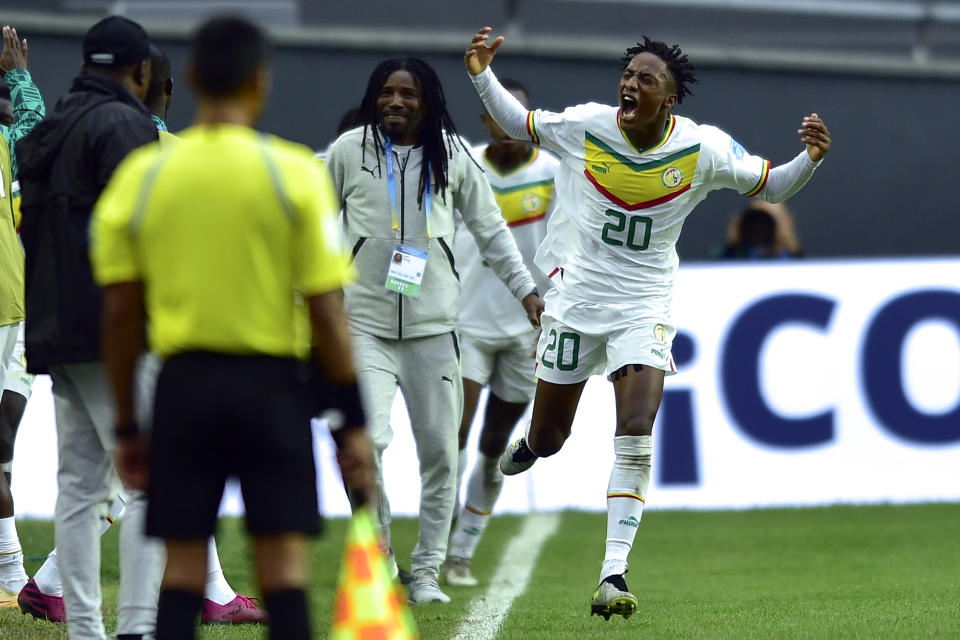 Senegal's Pape Demba Diop celebrates scoring his side's opening goal at a FIFA U-20 World Cup Group C soccer match against Israel at Diego Maradona stadium in La Plata, Argentina, Wednesday, May 24, 2023. (AP Photo/Gustavo Garello)