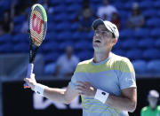 Canada's Vasek Pospisil reacts during his first round match against Russia's Daniil Medvedev at the Australian Open tennis championship in Melbourne, Australia, Tuesday, Feb. 9, 2021.(AP Photo/Rick Rycroft)