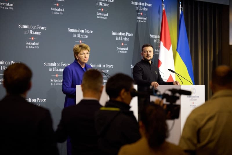 Ukrainian President Volodymyr Zelensky (R) and Swiss Federal President Viola Amherd give a press conference during a Summit on Peace in Ukraine at the luxury Burgenstock resort. -/Ukraine Presidency/dpa