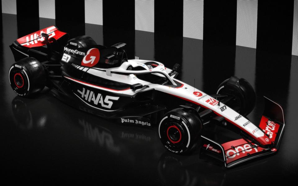 An image of the Haas VF23 car, which is mainly red, white and black - Moneygram Haas F1 team