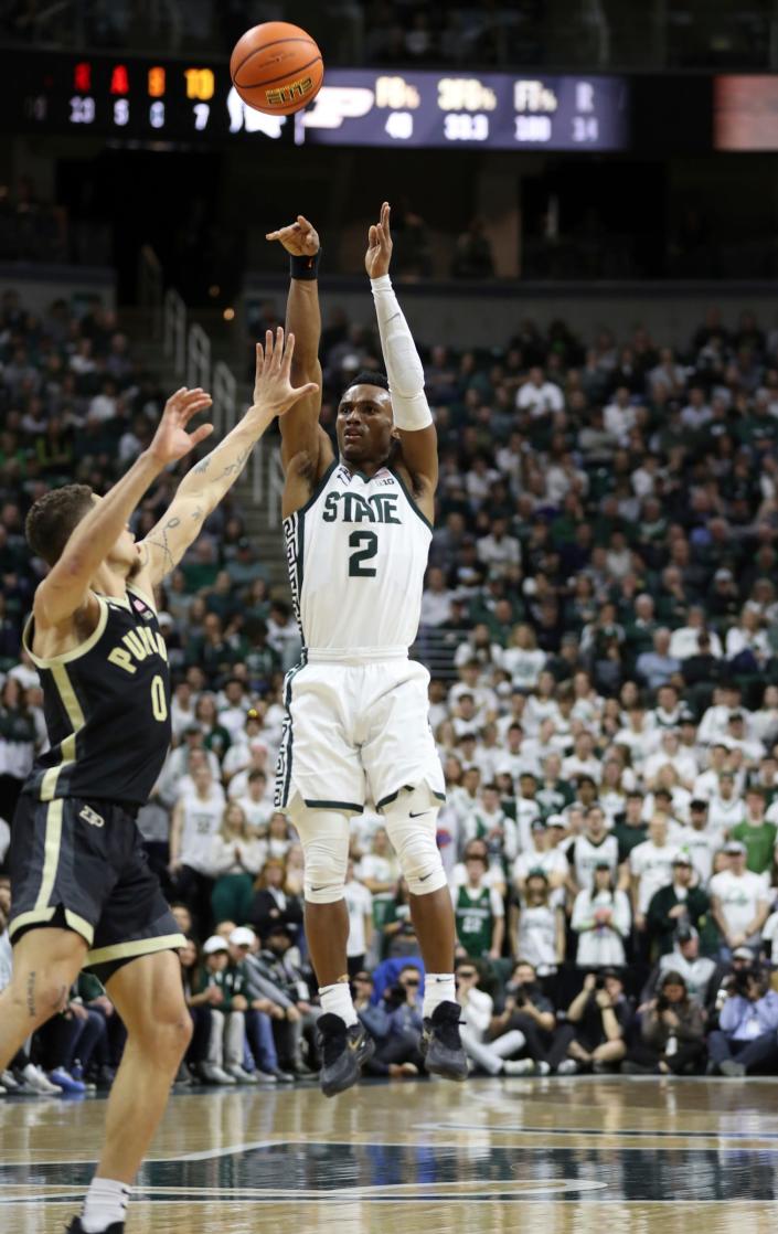 Michigan State Spartans guard Tyson Walker (2) scores against Purdue Boilermakers forward Mason Gillis (0) during the first half Monday, Jan.  16, 2023 at the Breslin Center in East Lansing.
