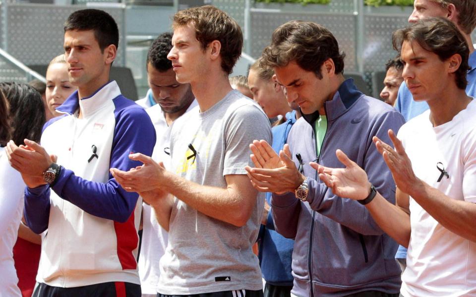 Rafael Nadal, Roger Federer, Andy Murray and Novak Djokovic stand side by side - SHUTTERSTOCK