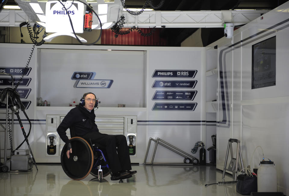 FILE - Williams Team Principal Frank Williams in his team box during a practice session at the track in Montmelo just outside Barcelona, Spain, on May 7, 2010. Sir Frank Williams, the founder and former team principal of Williams Racing, has died. He was 79. Williams took his motor racing team from an empty carpet warehouse to the summit of Formula One, overseeing 114 victories, a combined 16 drivers' and constructors' world championships, while becoming the longest-serving team boss in the sport's history. (AP Photo/David Ramos, File)