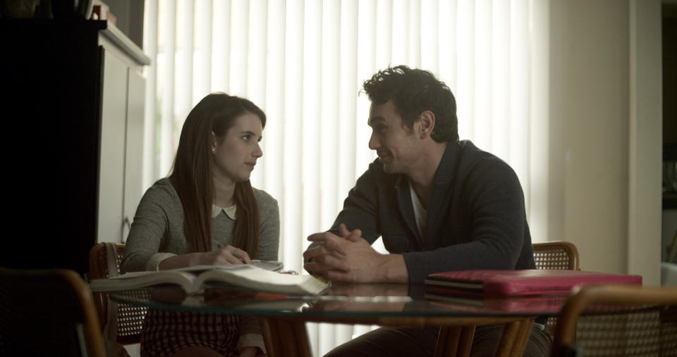 This photo released by Tribeca Films shows Emma Roberts, left, and James Franco in a scene from the film, "Palo Alto." (AP Photo/Tribeca Films)