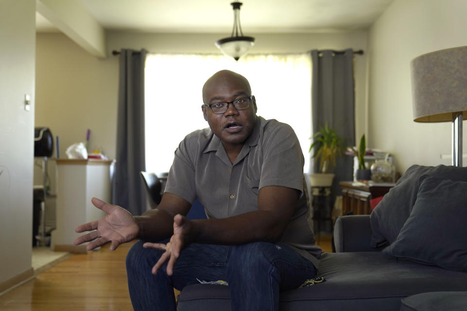 Terrence Hersey talks about his life after his stroke in 2015 at his home Friday, June 17, 2022, in South Holland, Ill. Hersey underwent extensive rehabilitation before his doctors eventually cleared him to return to work in 2016. But Union Pacific decided without ever having a doctor examine him that the stroke made him unfit to work for the railroad. Union Pacific has already lost three lawsuits over the way it dismisses employees with health conditions because of safety concerns, and the prospect of hundreds more similar lawsuits, including Hersey's case, looms over the railroad. (AP Photo/Charles Rex Arbogast)