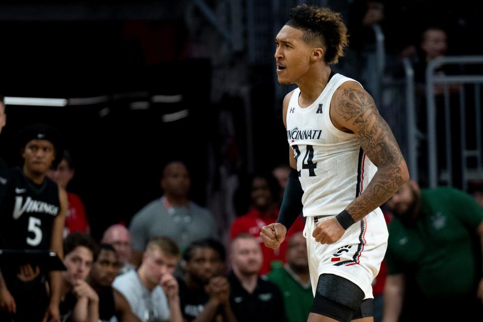 Cincinnati Bearcats guard Jeremiah Davenport (24) celebrates after making a block in the second half of the men’s NCAA basketball game at Fifth Third Arena in Cincinnati on Thursday, Nov. 10, 2022. Cincinnati Bearcats defeated Cleveland State Vikings 69-58.