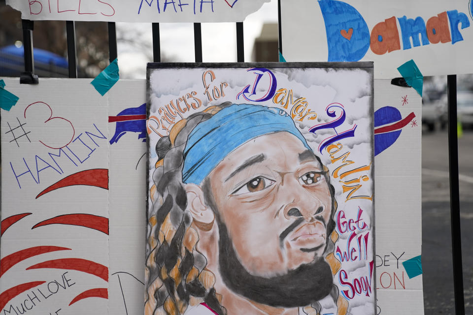 An artist's portrait of Buffalo Bills safety Damar Hamlin is displayed outside UC Medical Center, where Hamlin remains hospitalized, Thursday, Jan. 5, 2023, in Cincinnati. Hamlin has shown what physicians treating him are calling 