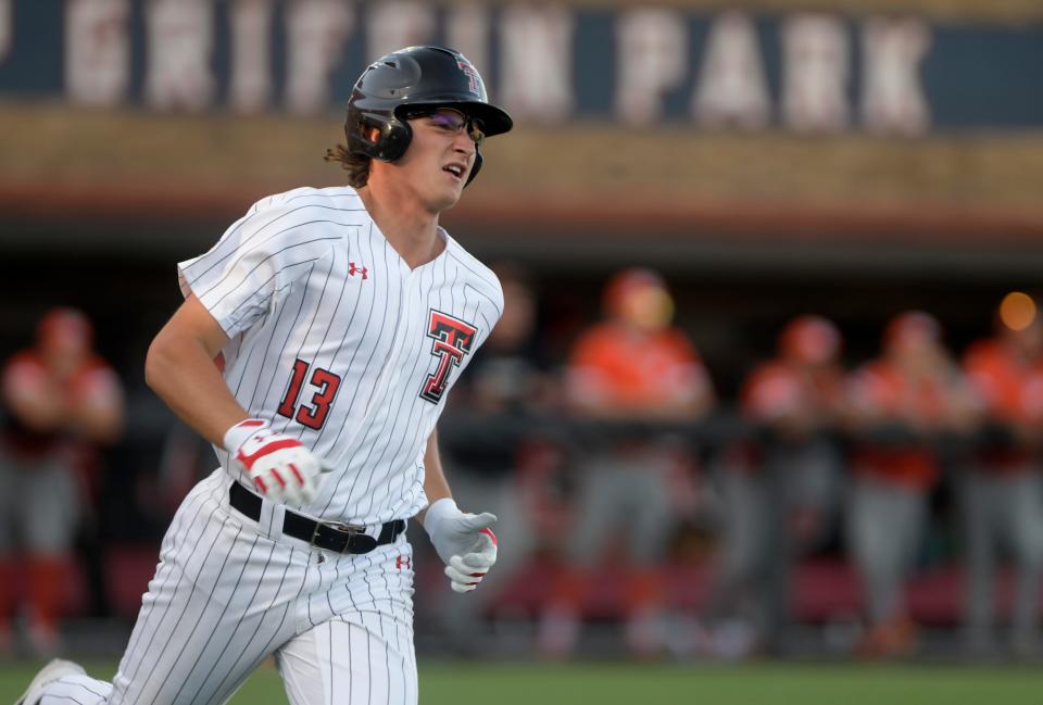 Texas Tech's infielder Gavin Kash (13) looks to see if he hit a home run against UTRGV in a non-conference baseball game, Tuesday, April 30, 2024, at Rip Griffin Park.