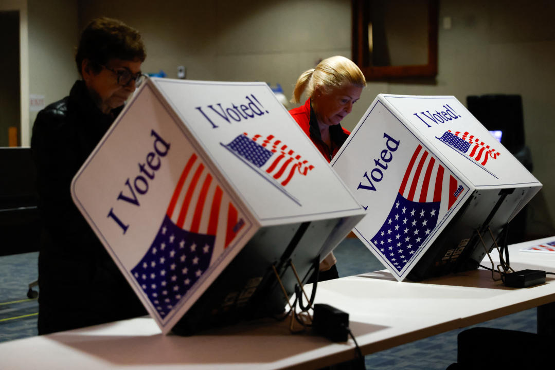 People vote at the Charleston Main Library in Charleston, S.C.