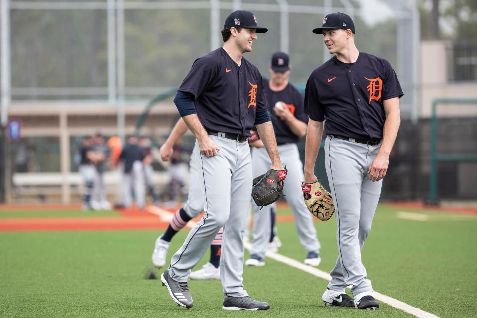 Casey Mize, left, talks to Tarik Skubal during Detroit Tigers spring training at TigerTown in Lakeland, Fla., Friday, Feb. 14, 2020.