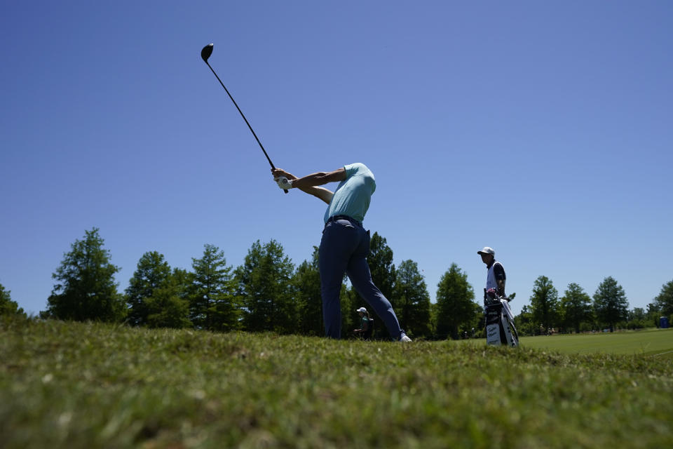 Taylor Moore hits off the rough along the seventh fairway during the third round of the PGA Zurich Classic golf tournament at TPC Louisiana in Avondale, La., Saturday, April 22, 2023. (AP Photo/Gerald Herbert)