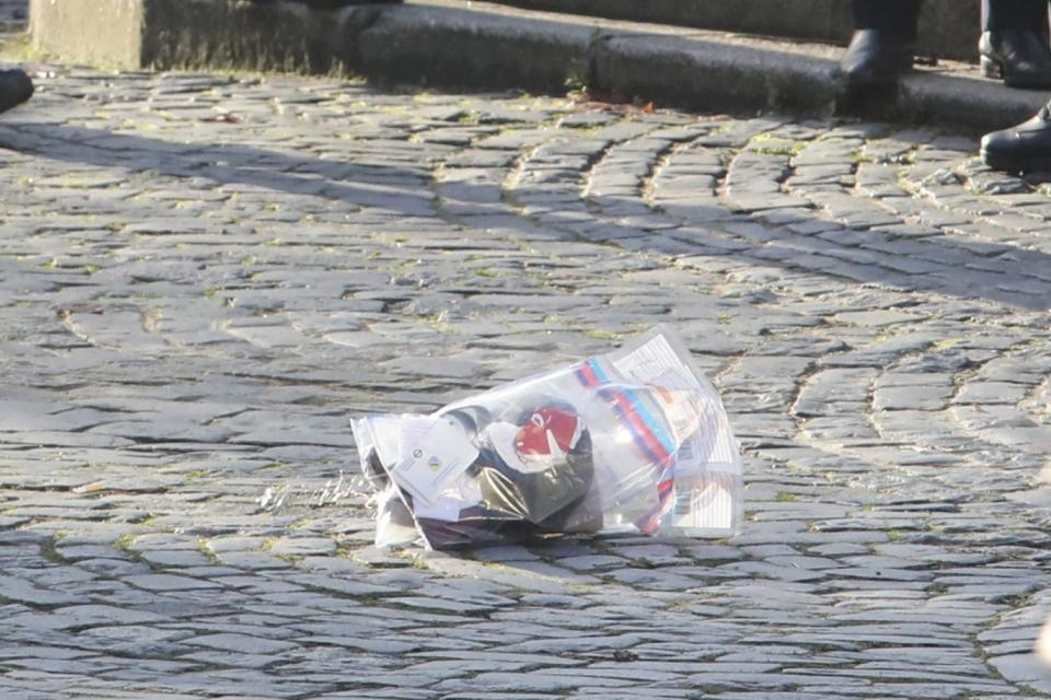 Police at the scene collect evidence after the man was detained (Alex Lentati)