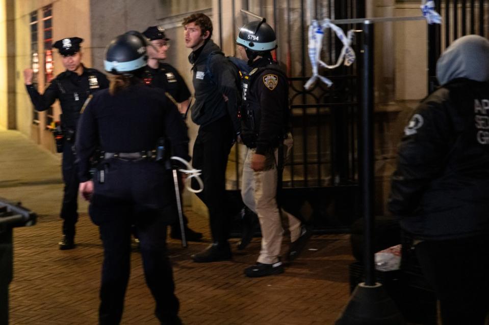 Student protesters are arrested by police and removed from the campus of Columbia University. Getty Images