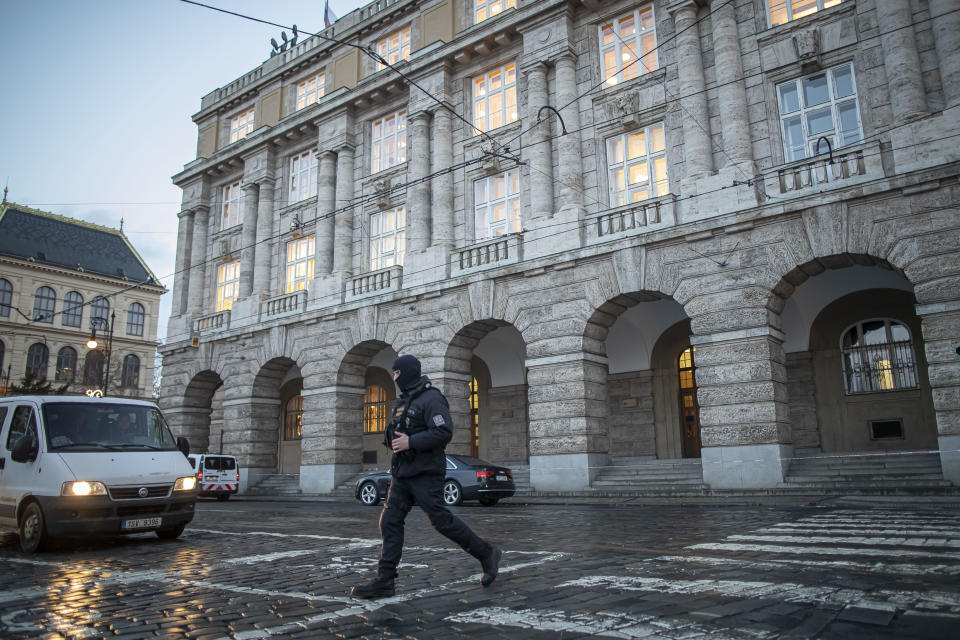 A police officer walks around the building of Charles University where a mass shooting took place on Dec. 22, 2023 in Prague, Czech Republic. / Credit: Getty Images