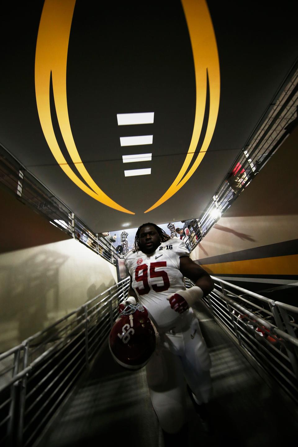 GLENDALE, AZ - JANUARY 11: Darren Lake #95 of the Alabama Crimson Tide walks to the field prior to the 2016 College Football Playoff National Championship Game against the Clemson Tigers at University of Phoenix Stadium on January 11, 2016 in Glendale, Arizona. (Photo by Christian Petersen/Getty Images)