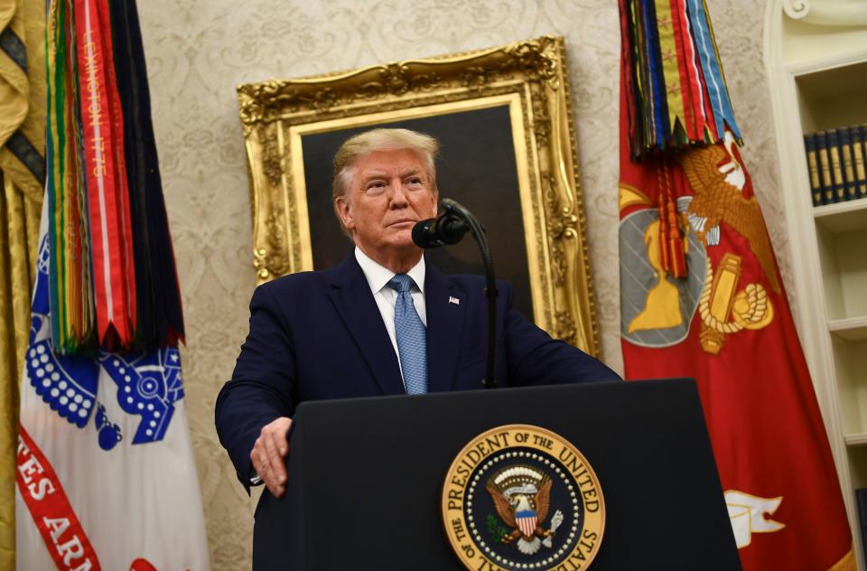 US President Donald Trump speaks before awarding the Medal of Freedom to former Attorney General Edwin Meese during a ceremony in the Oval Office at the White House in Washington, DC on October 8, 2019. (Photo by Brendan Smialowski / AFP) (Photo by BRENDAN SMIALOWSKI/AFP via Getty Images)