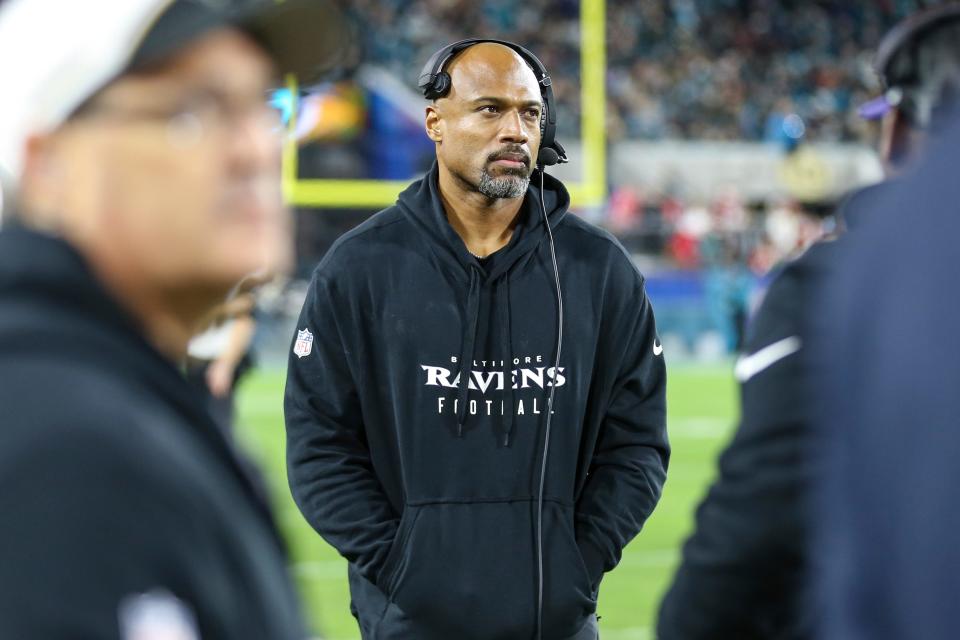 FILE - Baltimore Ravens assistant head coach/defensive line Anthony Weaver watches warm-ups before an NFL football game against the Jacksonville Jaguars, Sunday, Dec. 17, 2023, in Jacksonville, Fla. The Miami Dolphins have named former Baltimore Ravens assistant head coach and defensive line coach Anthony Weaver as their defensive coordinator, the team announced Saturday afternoon, Feb. 3, 2204. (AP Photo/Gary McCullough, File)