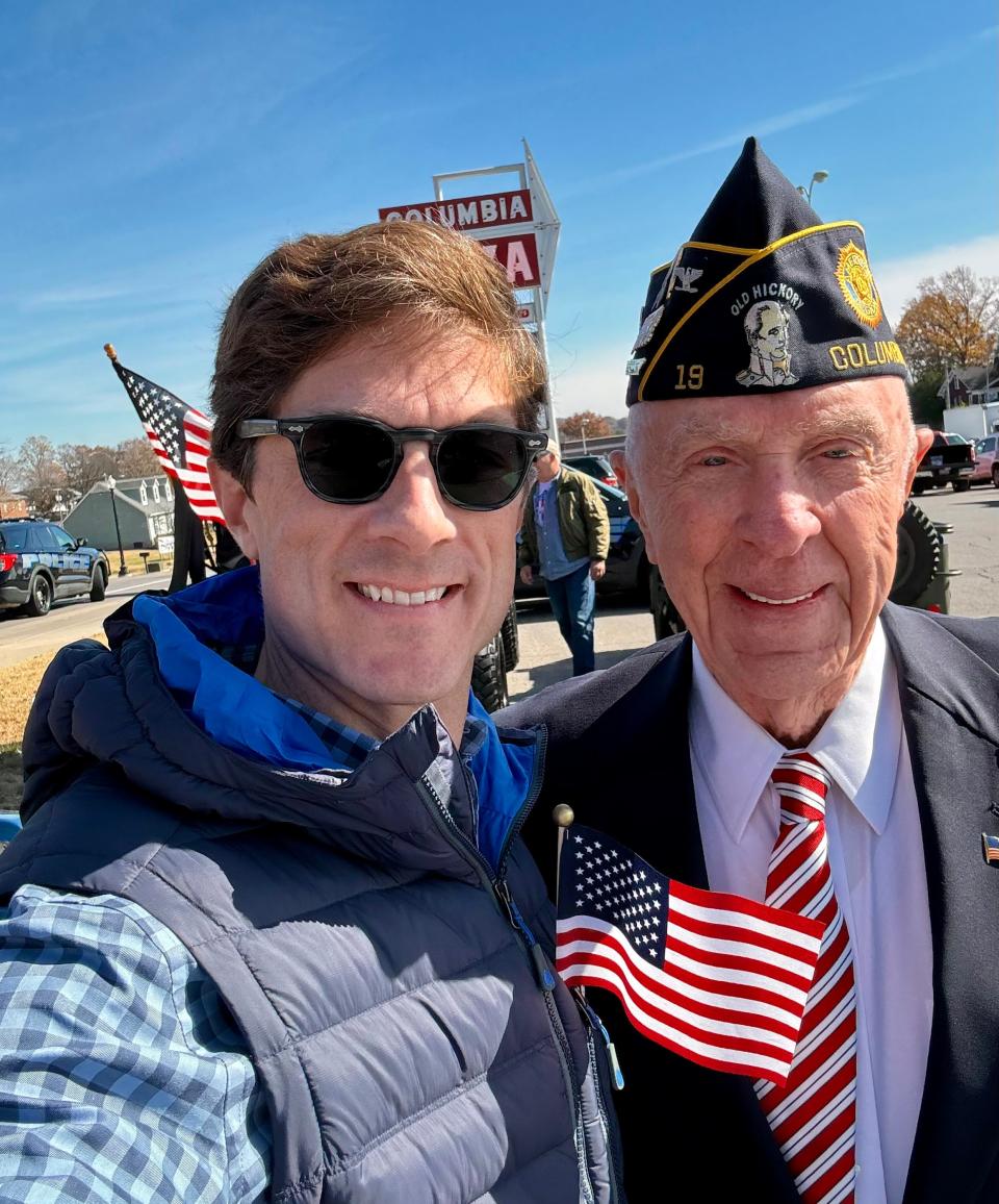 Columbia Mayor Chaz Molder stands with retired U.S. Army National Guard Colonel Ashley Brown during the 2023 Columbia Veterans Day Parade. Brown was selected as the 2023 Grand Marshal for the 37th annual Columbia Main Street Christmas Parade.
