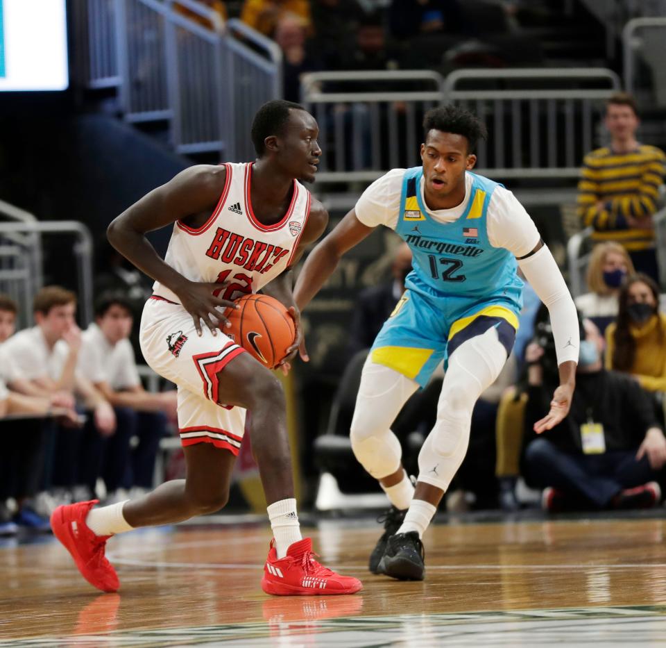 Marquette forward Olivier-Maxence Prosper defends Northern Illinois forward Zool Kueth in the first half Saturday at Fiserv Forum.