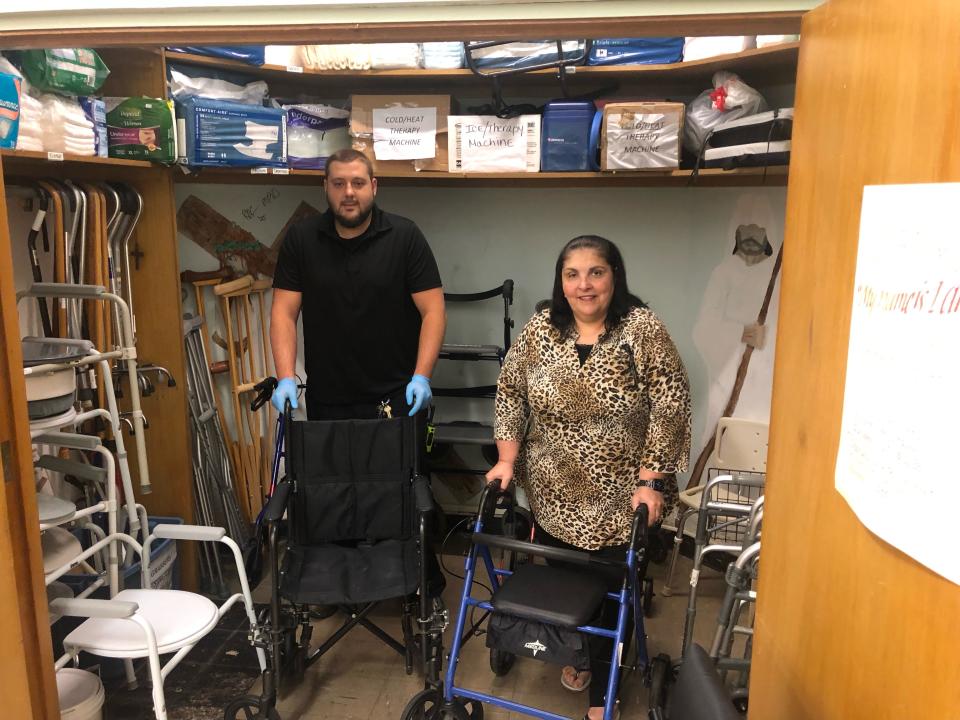 Swansea COA Executive Director Laurie Pimentel and custodian Andrew Pelland show off some of the medical equipment and supplies that are available for Swansea residents who need them.