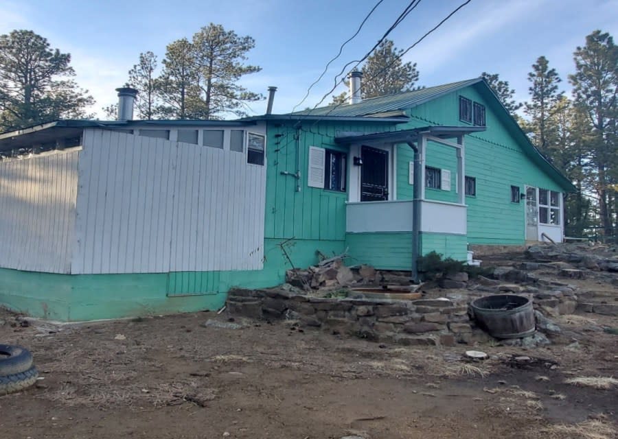 Pam Abreu’s family home before the Hermit’s Peak Calf Canyon Wildfire