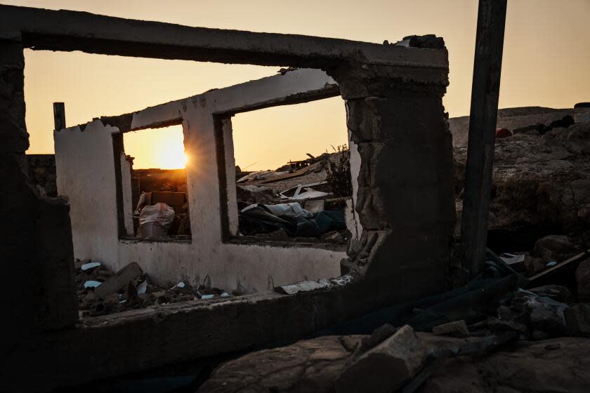 KHIRBET ZANUTA, OCCUPIED WEST BANK -- NOVEMBER 16, 2023: A Palestinian home sits abandoned after its inhabitants left due to repeated instances of Israeli settler violence and harassment, in the Palestinian village of Khirbet Zanuta, Occupied West Bank, Thursday, Nov. 16, 2023. IsraelOs war against Hamas in Gaza has intensified the settler movement in the Israeli occupied West Bank, where for decades Jewish enclaves have risen from strategic high grounds to prevent an independent Palestinian state. About 500,000 settlers, with the help of army and police, essentially have free rein amid 2.7 million Palestinians. Nearly 1,000 Palestinians have fled West Bank villages and small communities in recent weeks after settlers demolished and burned homes, destroyed olive trees, blocked roads, and cut off electricity and water, according to BOTselem, an Israeli human rights group. Much of the harassment and violence reverberate through Area C, which covers about 60 percent of the West Bank and is home to about 130 Jewish settlements and 100 outposts. The region is administered by the autonomous Palestinian Authority but controlled by Israeli forces. The Jewish settlements D Palestinians face restrictions on developing land D are considered by most nations an illegal Israeli design to annex territory in the Jordan Valley and Judean Desert. (MARCUS YAM / LOS ANGELES TIMES)