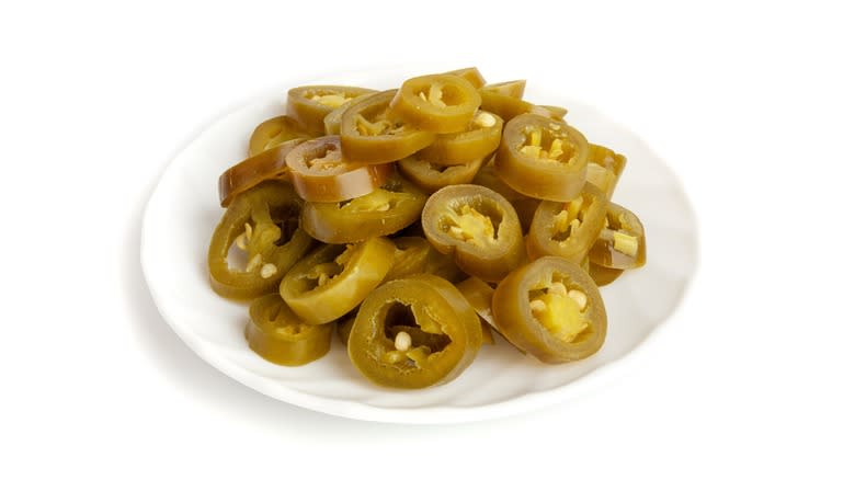 plate of sliced jalapeno peppers
